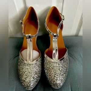 Ladies silver dance shoes, brand new never worn, leather soles.
